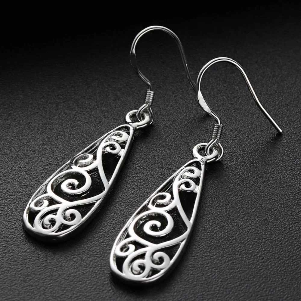 Any 2/$20! Silver Openwork Teardrop Boho Earrings - Picture 3 of 10